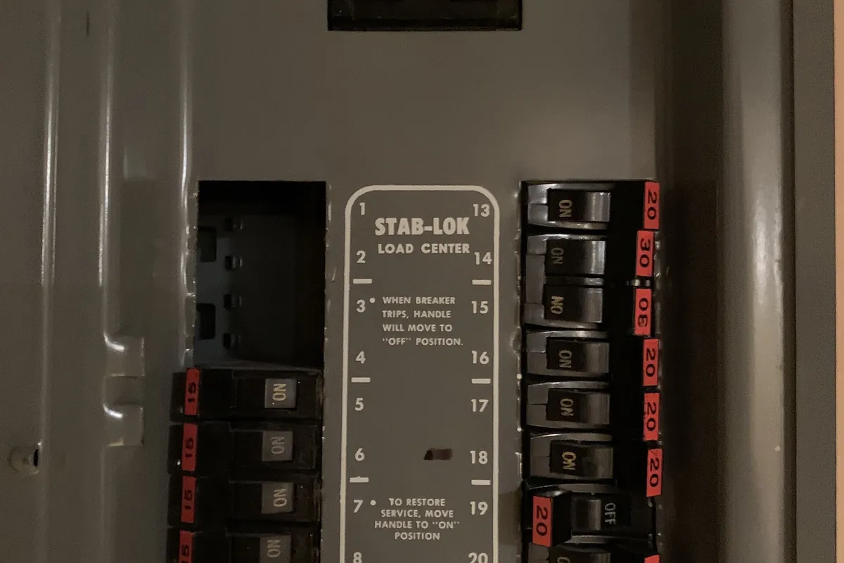 Interior of an older circuit breaker panel