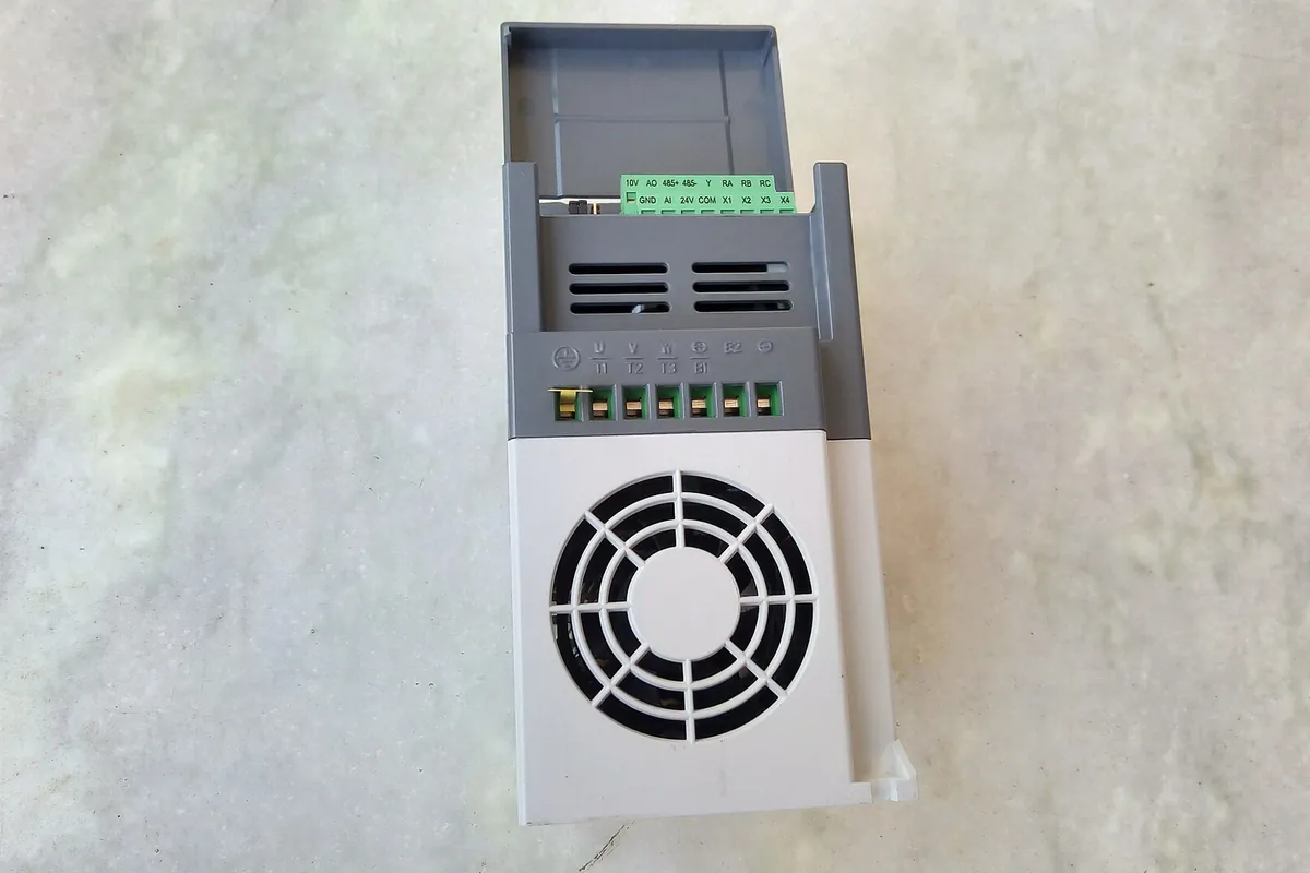 Variable frequency drive unit mounted on a wall