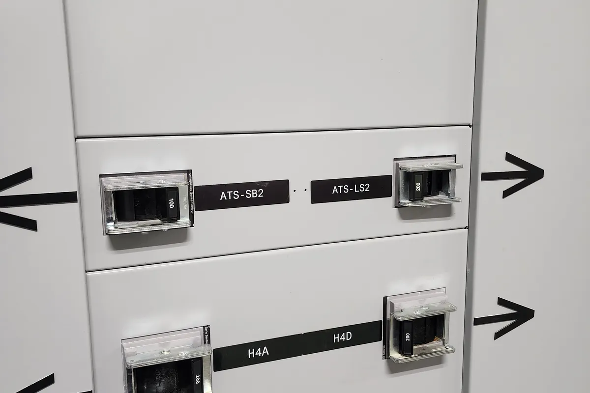 Labelled automatic transfer switches with arc flash warning label