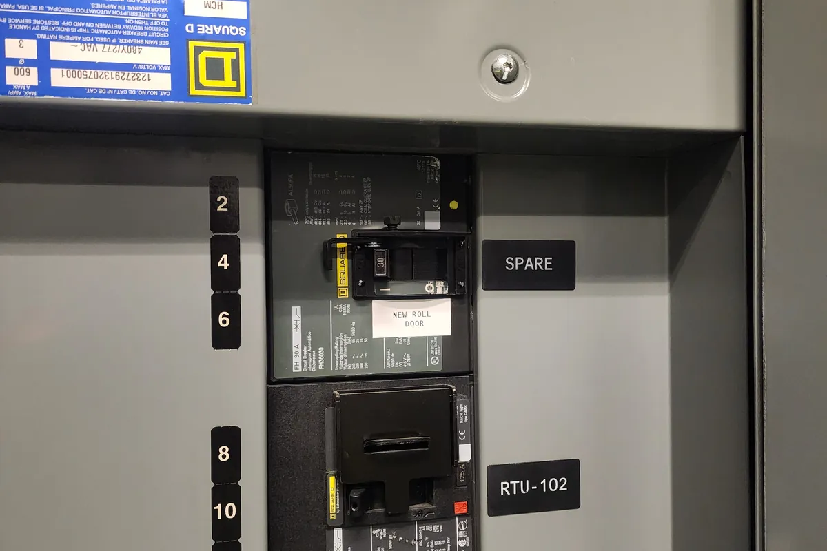 Panelboard interior with breakers and circuit numbering