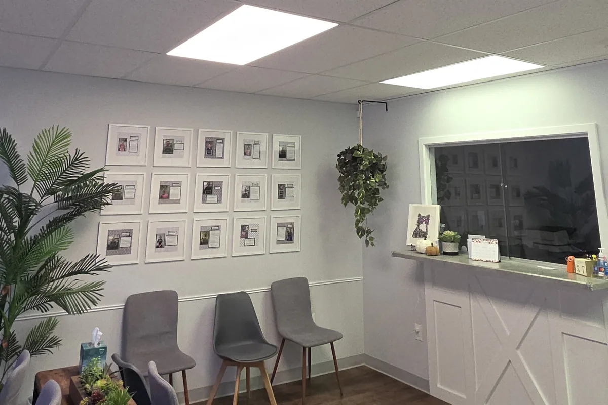 Finished office reception area with recessed lighting