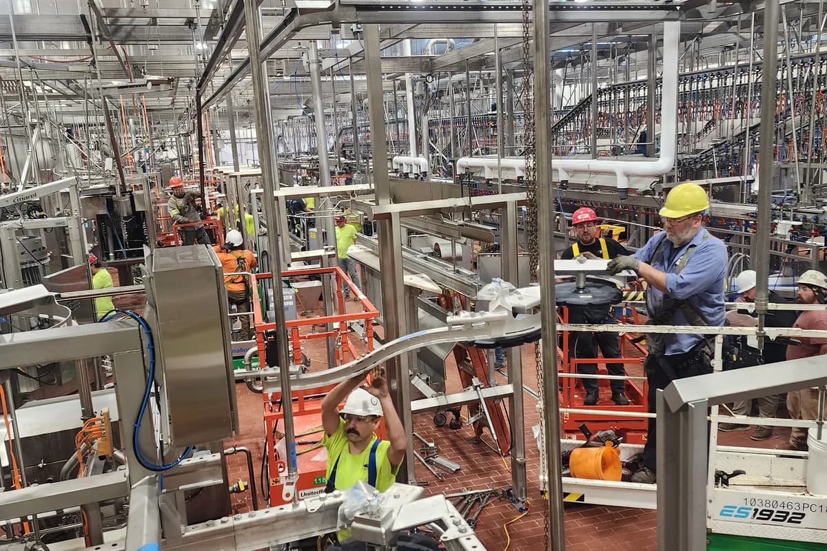 Second view of electrical work in progress on the plant floor
