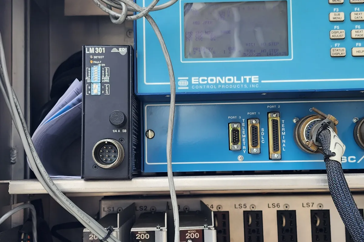 Insulation resistance tester connected to a panel during electrical testing