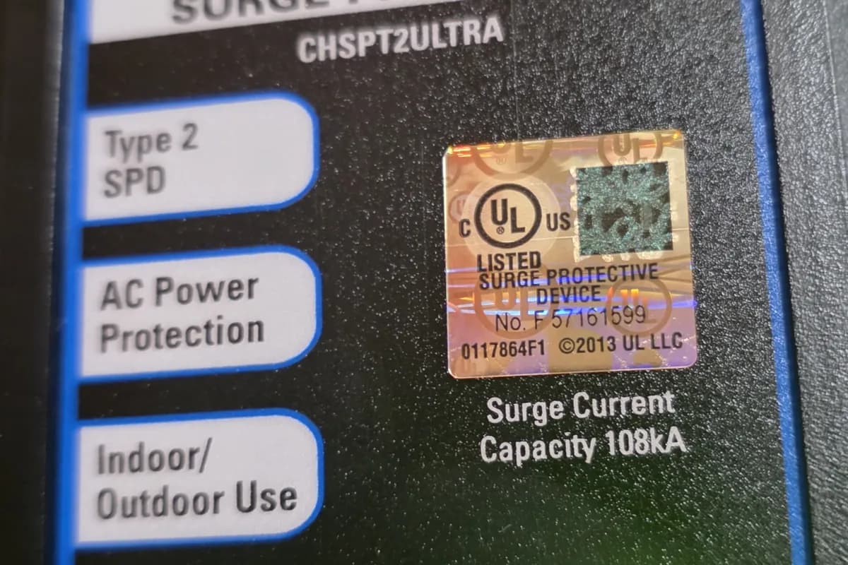 Surge protective device installed at a service with status indicators